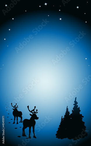 winter background with reindeer silhouettes
