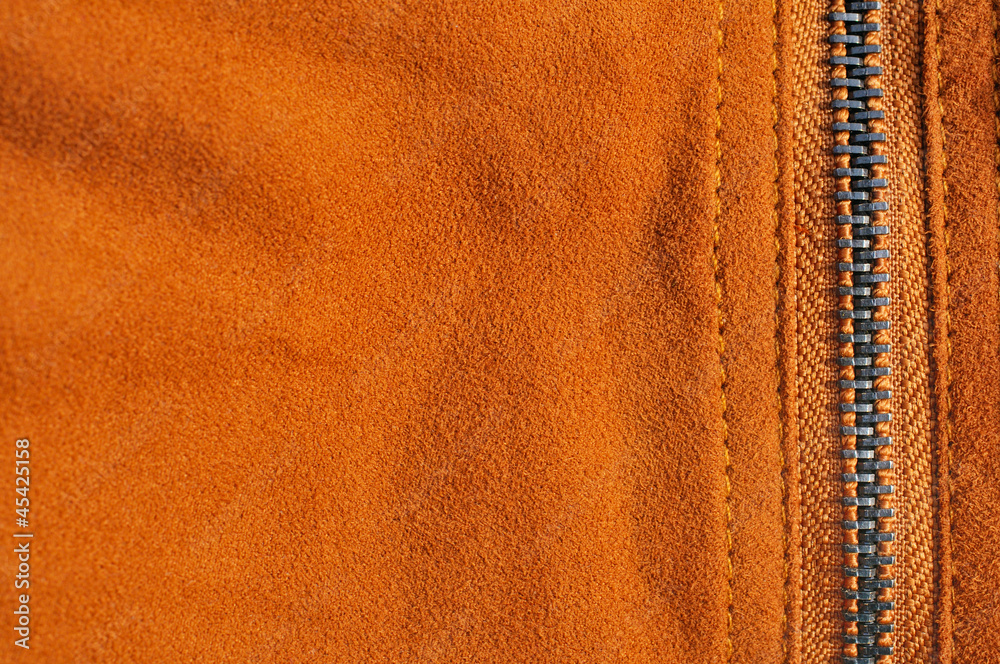 Abstract chamois background with seam and zip fastener Abstract chamois background with seam and zip fastener