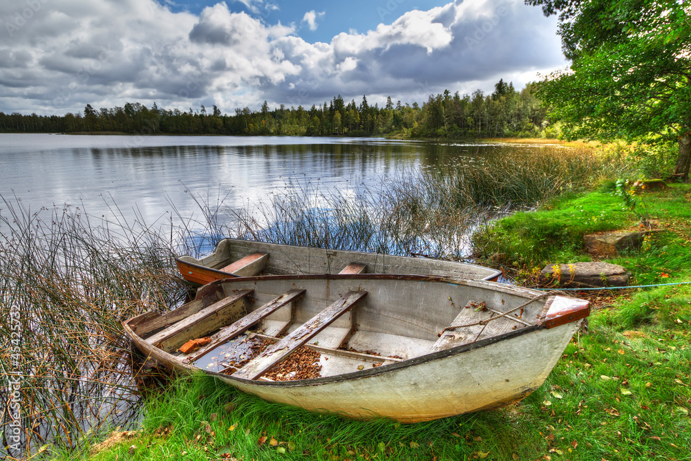 Swedish lake with boat in summer time - obrazy, fototapety, plakaty 