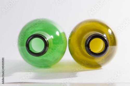 two wine bottle's necks closeup