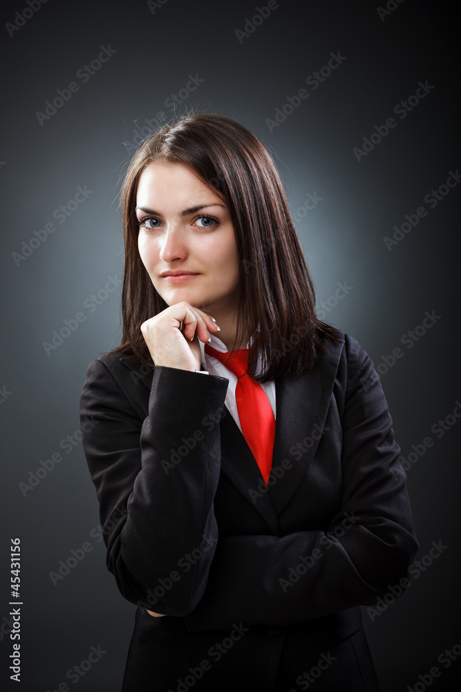 Young businesswoman thinking isolated on gray backgound Young businesswoman thinking isolated on gray backgound