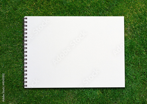 notebook on grassland