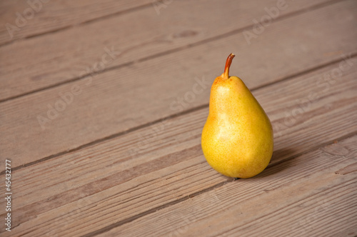 Pear on table