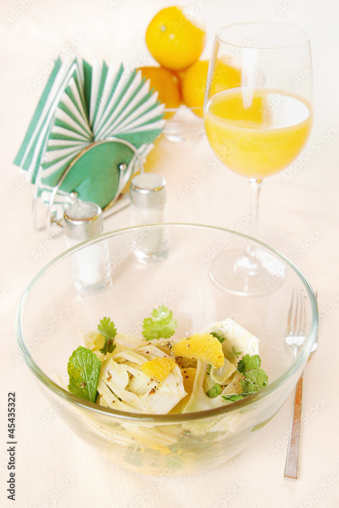 Salad made of fennel with oranges in a glass plate