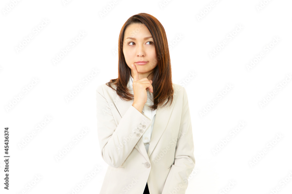 困惑した表情のオフィスレディー