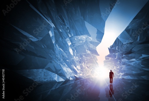 Man walks through the fantasy crystal corridor with glowing end photo