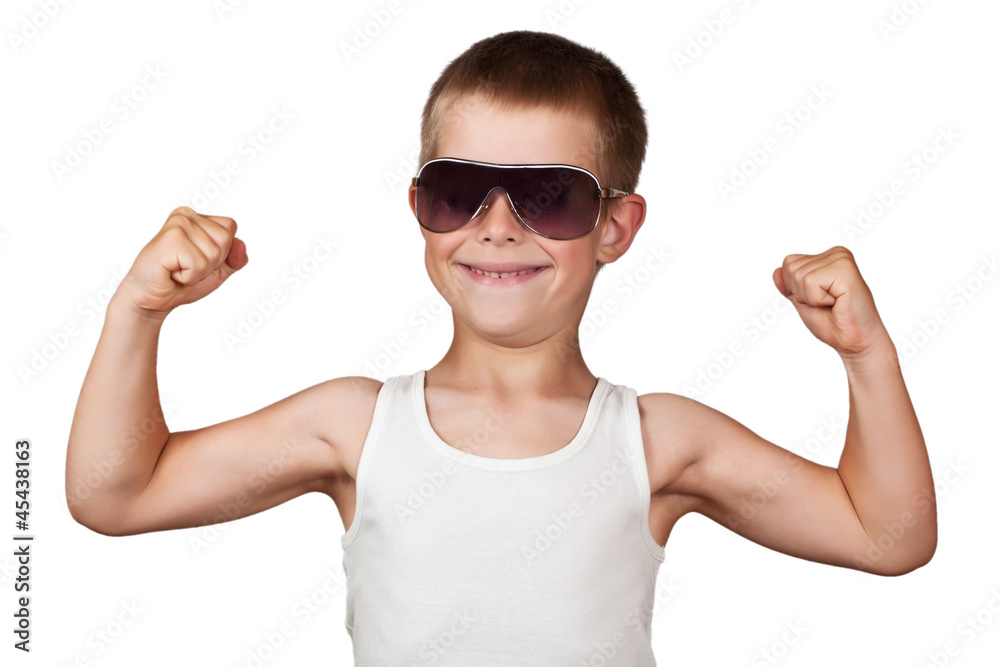 boy showing his muscles isolated on white