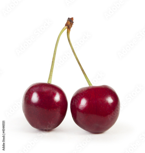 Fotografija Two perfect sweet cherries solated on a white background