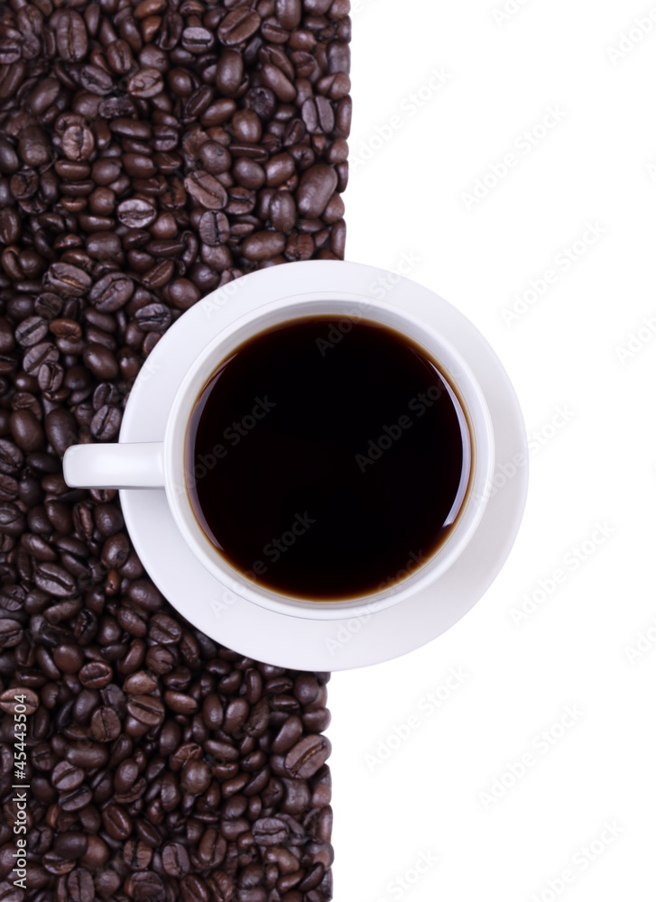 Fototapeta premium Coffee cup with espresso coffee beans