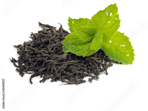 dry black tea leaves and mint