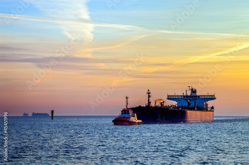 Seascape - Tanker ship at sunrise.