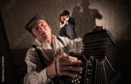 Foto Two Dancers Near Bandoneon Player