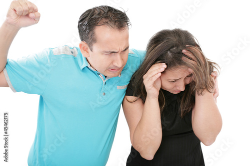 Terrified abused woman trying to stop the attack and defend hers