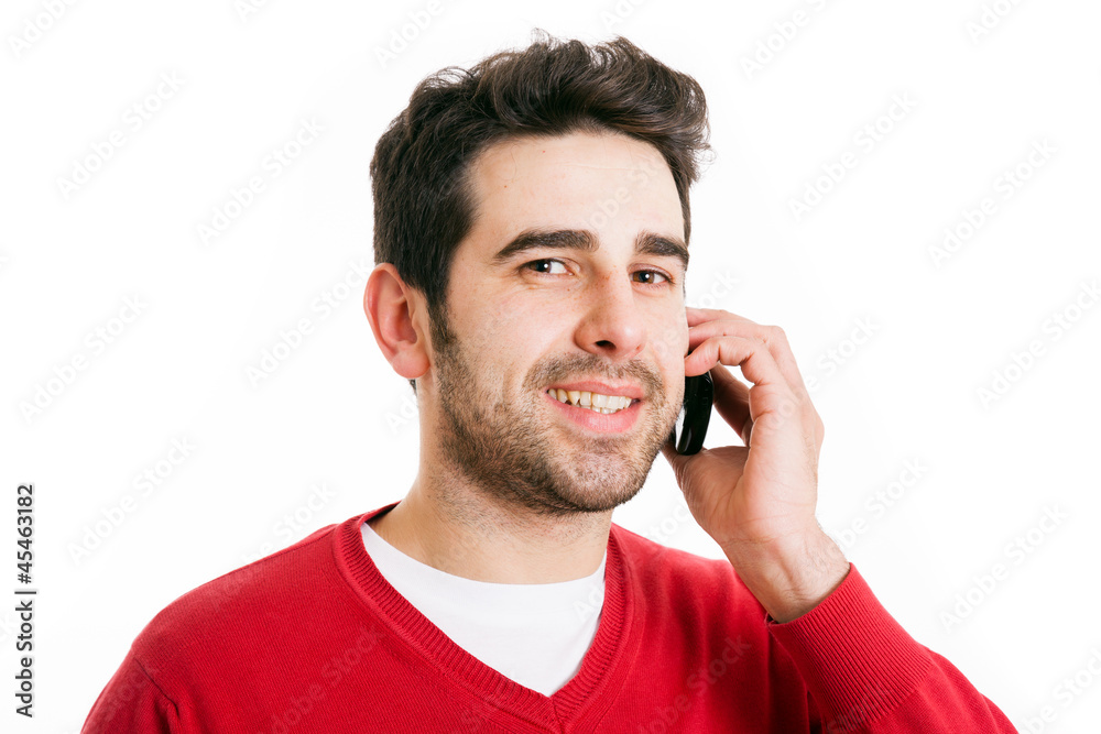 young casual man talking on the phone, isolated on white young casual man talking on the phone, isolated on white