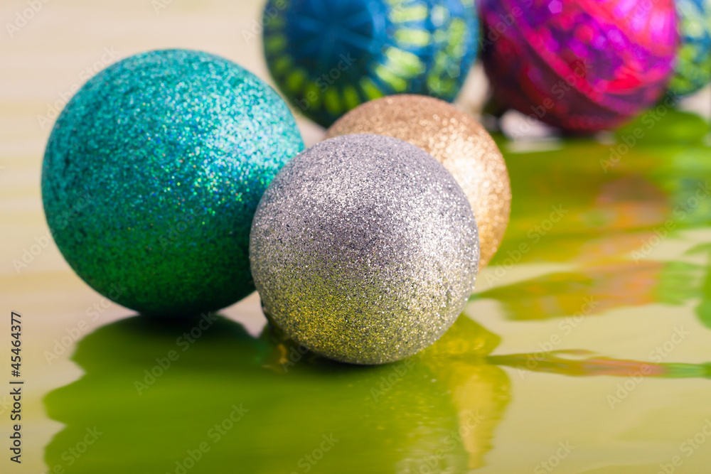 Christmas balls on green background Christmas balls on green background