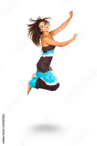Happy Young Woman Jumping and Smiling