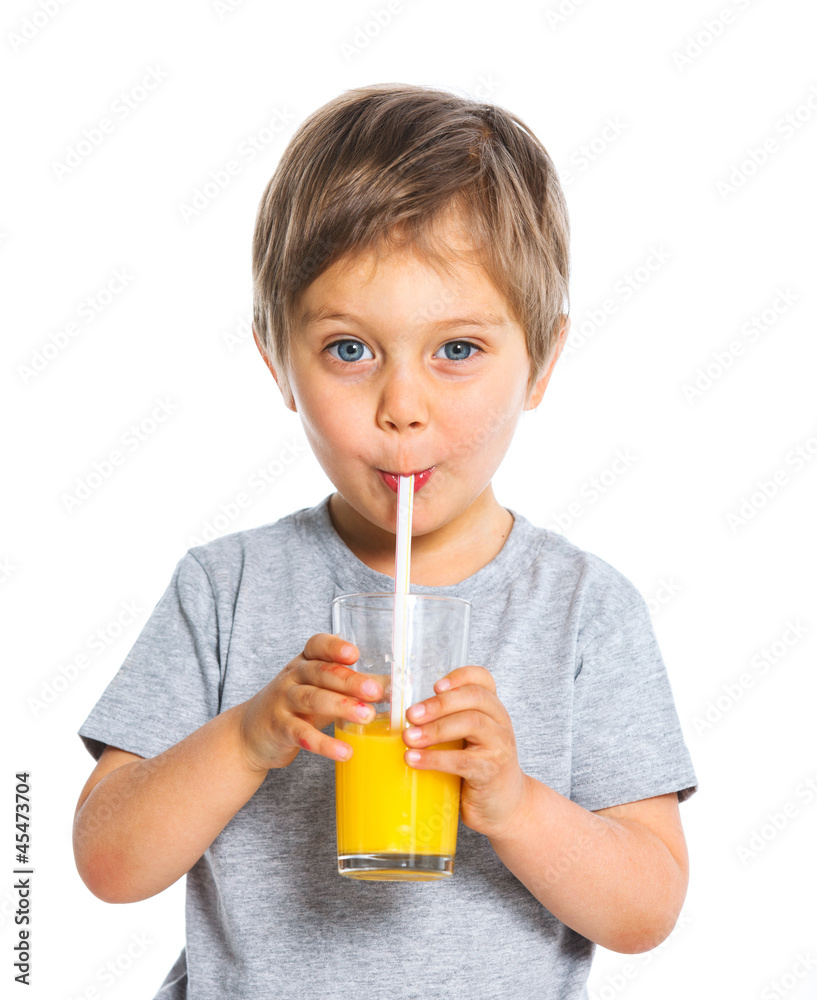 Portrait of little boy drinking orange juice Portrait of little boy drinking orange juice