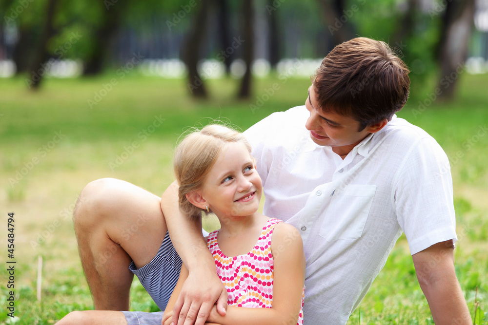 Father and daughter in the park Father and daughter in the park