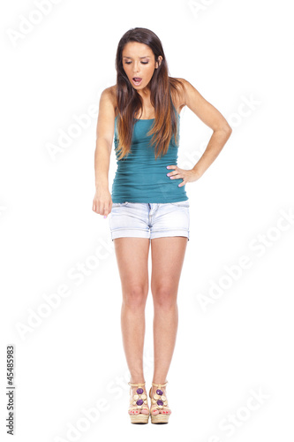 attractive young woman looking shocked isolated on white backgro © maximino gomes