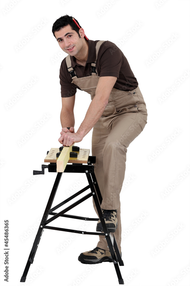 carpenter at work with workbench