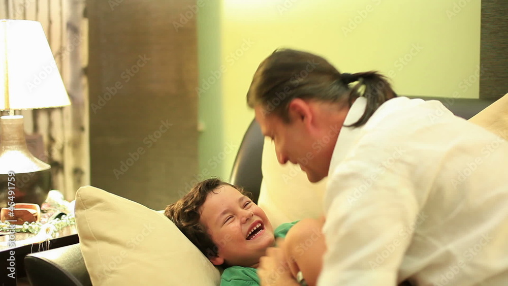 father and son playing