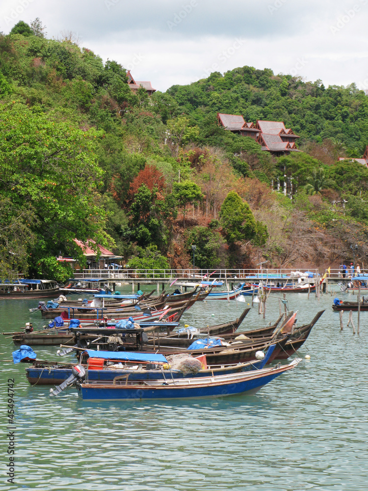 Fishing boats at the shore of LAngkawi island, Malaysia Fishing boats at the shore of LAngkawi island, Malaysia