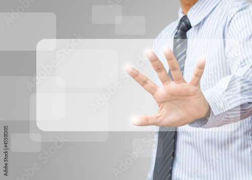 business hand pushing on a touch screen interface