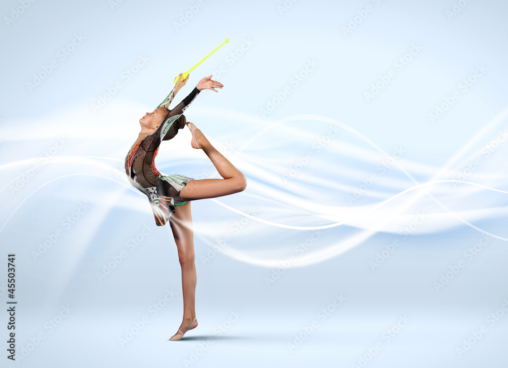 Fototapeta premium Young woman in gymnast suit posing