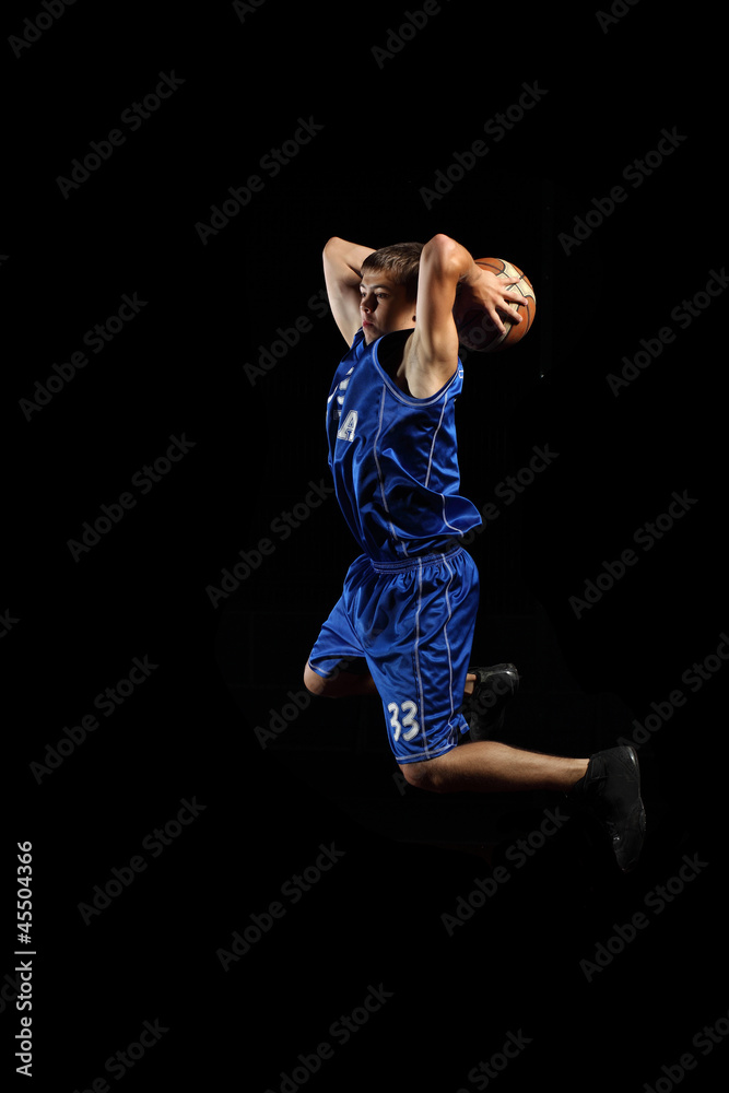 Basketball player with a ball