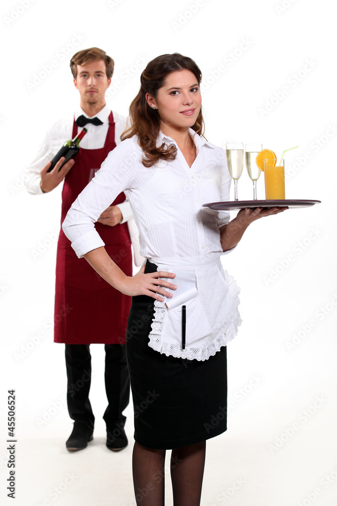 Waiter and waitress with a drinks tray Waiter and waitress with a drinks tray