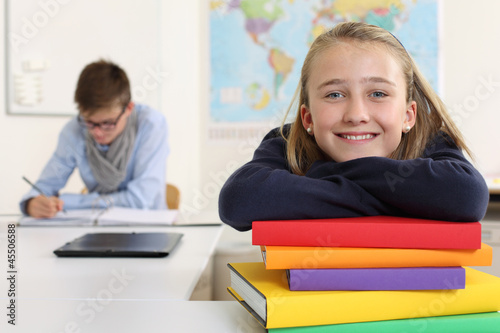 Happy student in her classroom