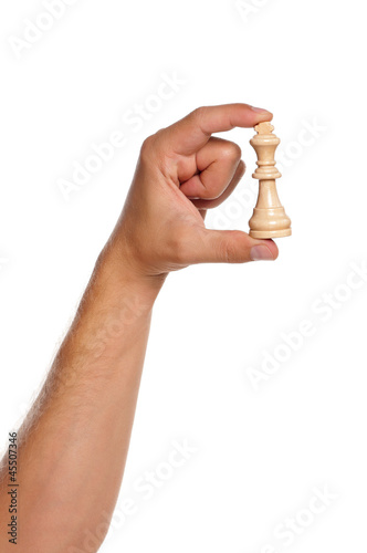 Hand with chess