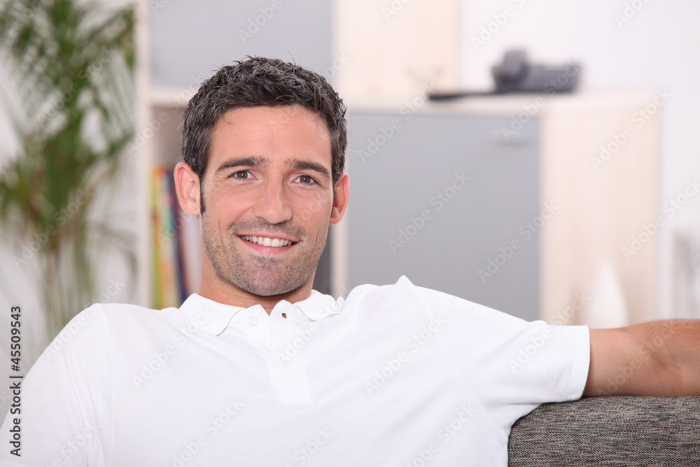 Man sitting on sofa