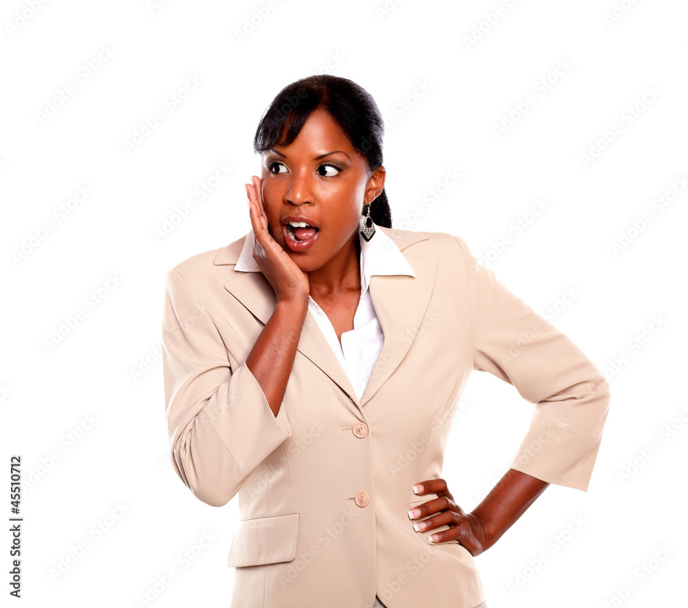 Surprised executive young woman looking right Surprised executive young woman looking right
