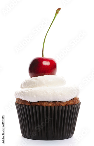 Obraz na płótnie Cupcake with whipped cream and cherry w salonie