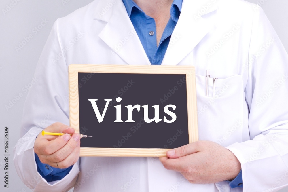 Doctor shows information on blackboard: virus Doctor shows information on blackboard: virus