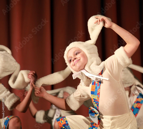 Dance show with girl in white rabbit suit