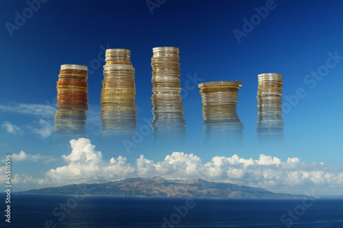 Stakes of Coins against Seascape