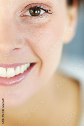 Closeup of beautiful woman s smile