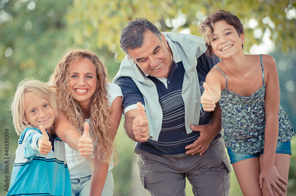 Happy Family with Thumbs Up