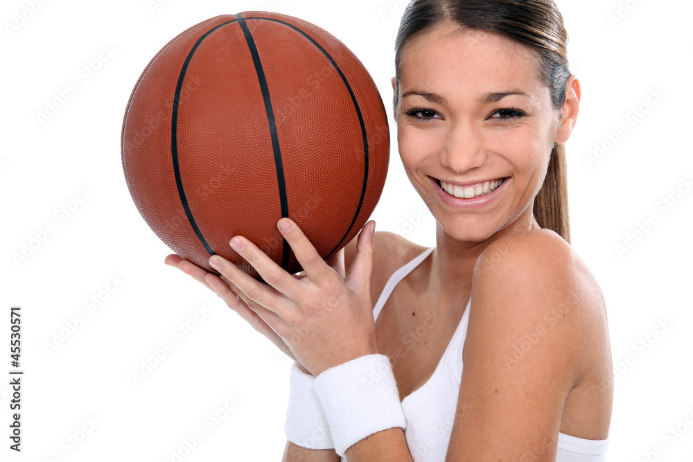 Brunette holding basketball