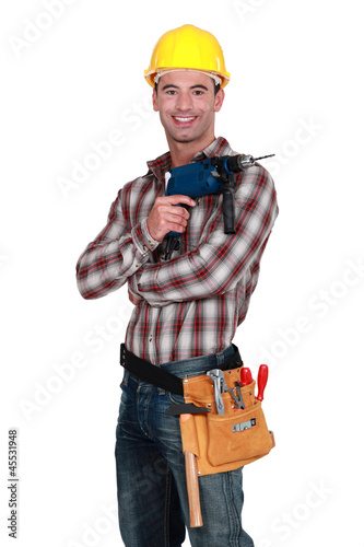 Man with a powerdrill photo