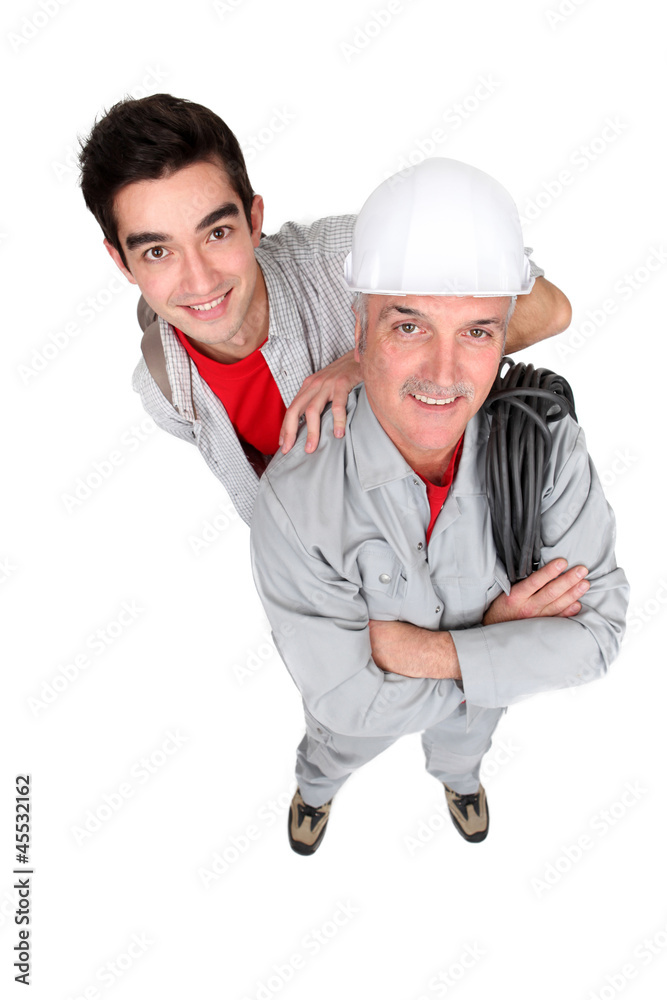 Electrician happy to have help from teenage son Electrician happy to have help from teenage son