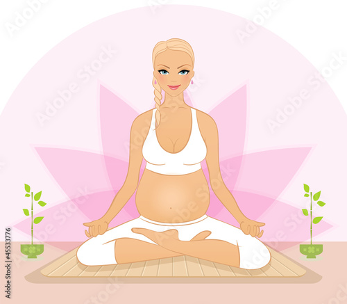 Pregnant woman doing yoga exercises