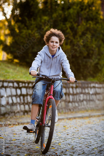 Fototapeta Naklejka Na Ścianę i Meble -  Boy biking