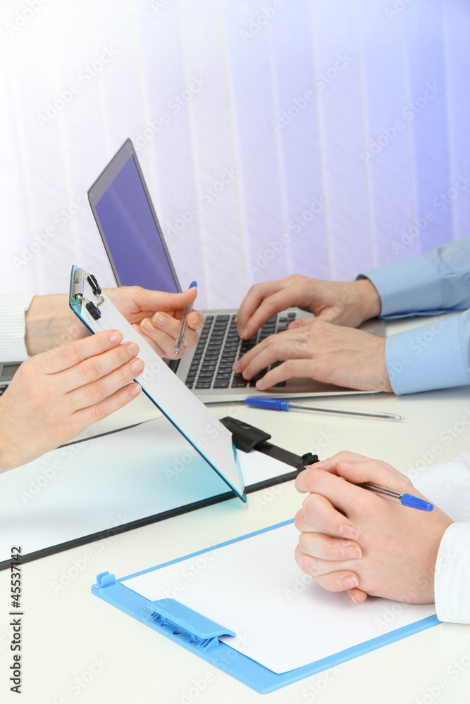 Fototapeta premium close up of business people hands during teamwork