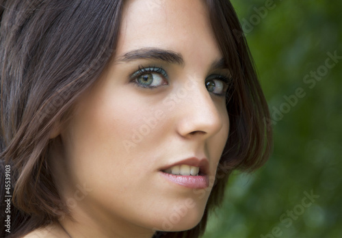 Face of attractive woman with stunning eyes