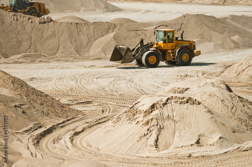 Excavator at gravel pit
