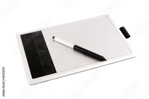 Modern digital drawing pad, pencils.
