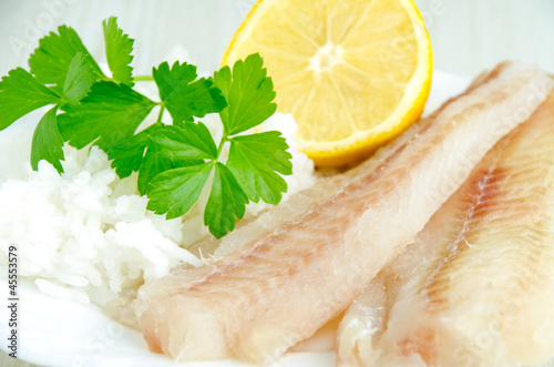 Raw fish fillets and rice